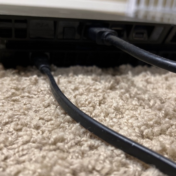 Selling a great condition ps4 comes with a charging cord controller and a cord - Picture 2 of 4